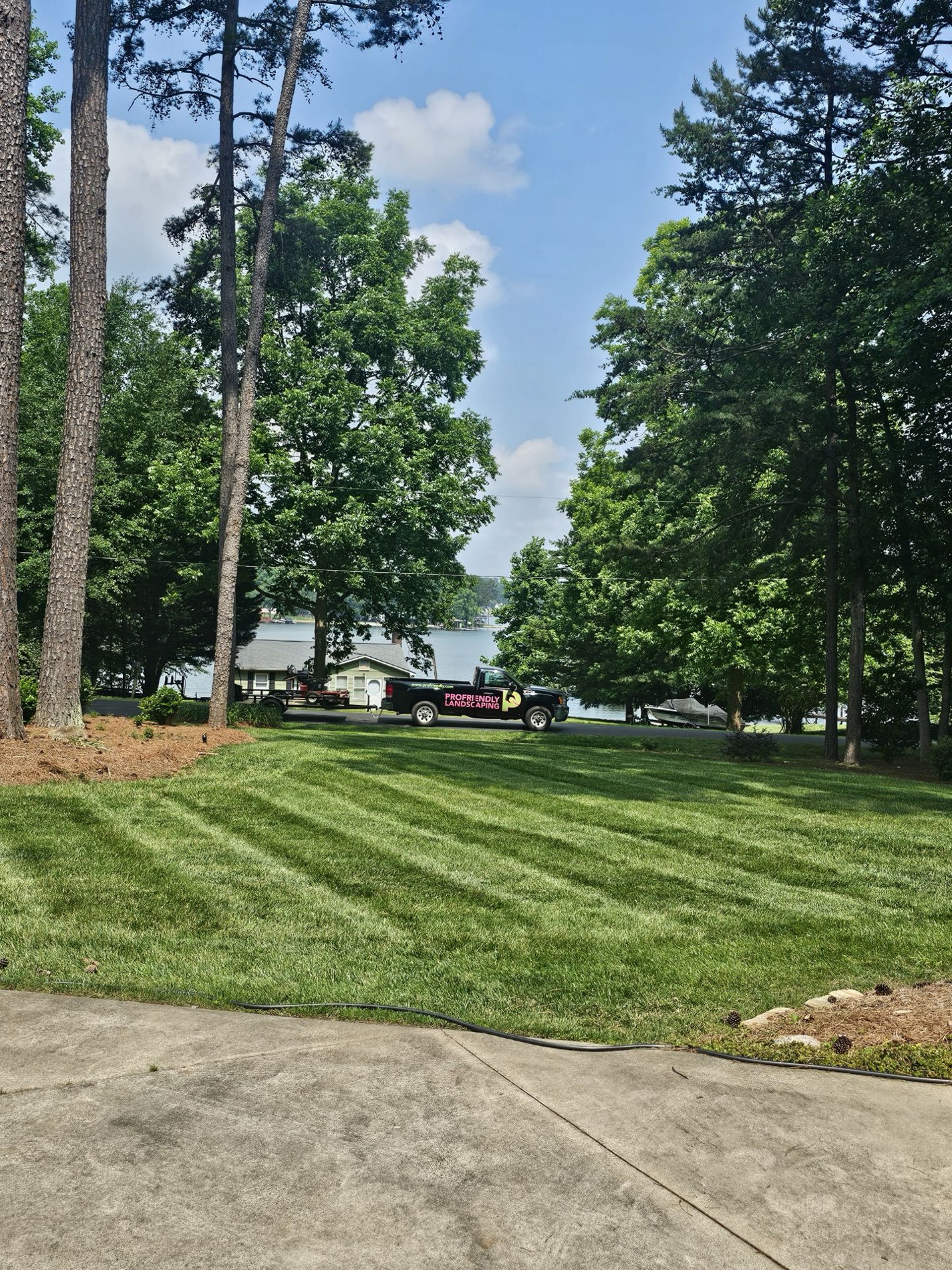 A freshly mowed and striped suburban lawn