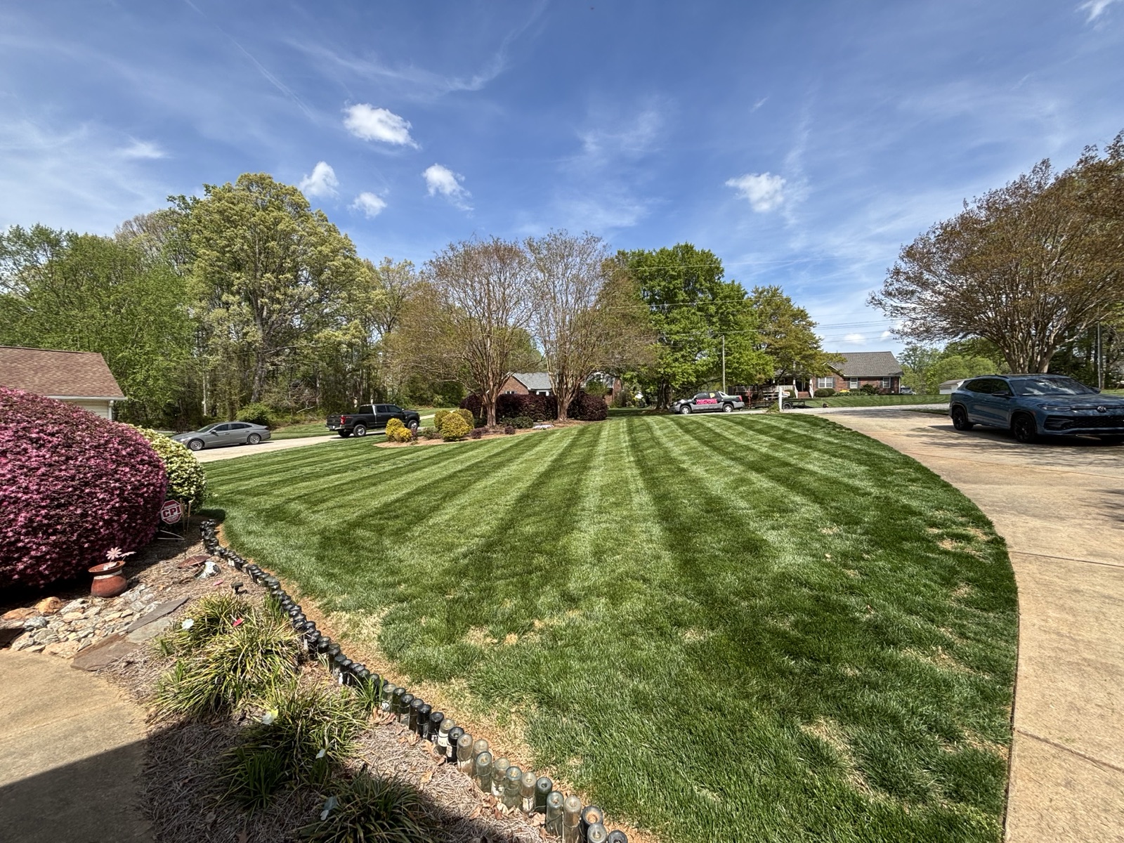 A well-maintained striped lawn in a planned community